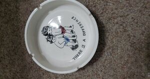 Vintage White Ashtray with Cartoon Design